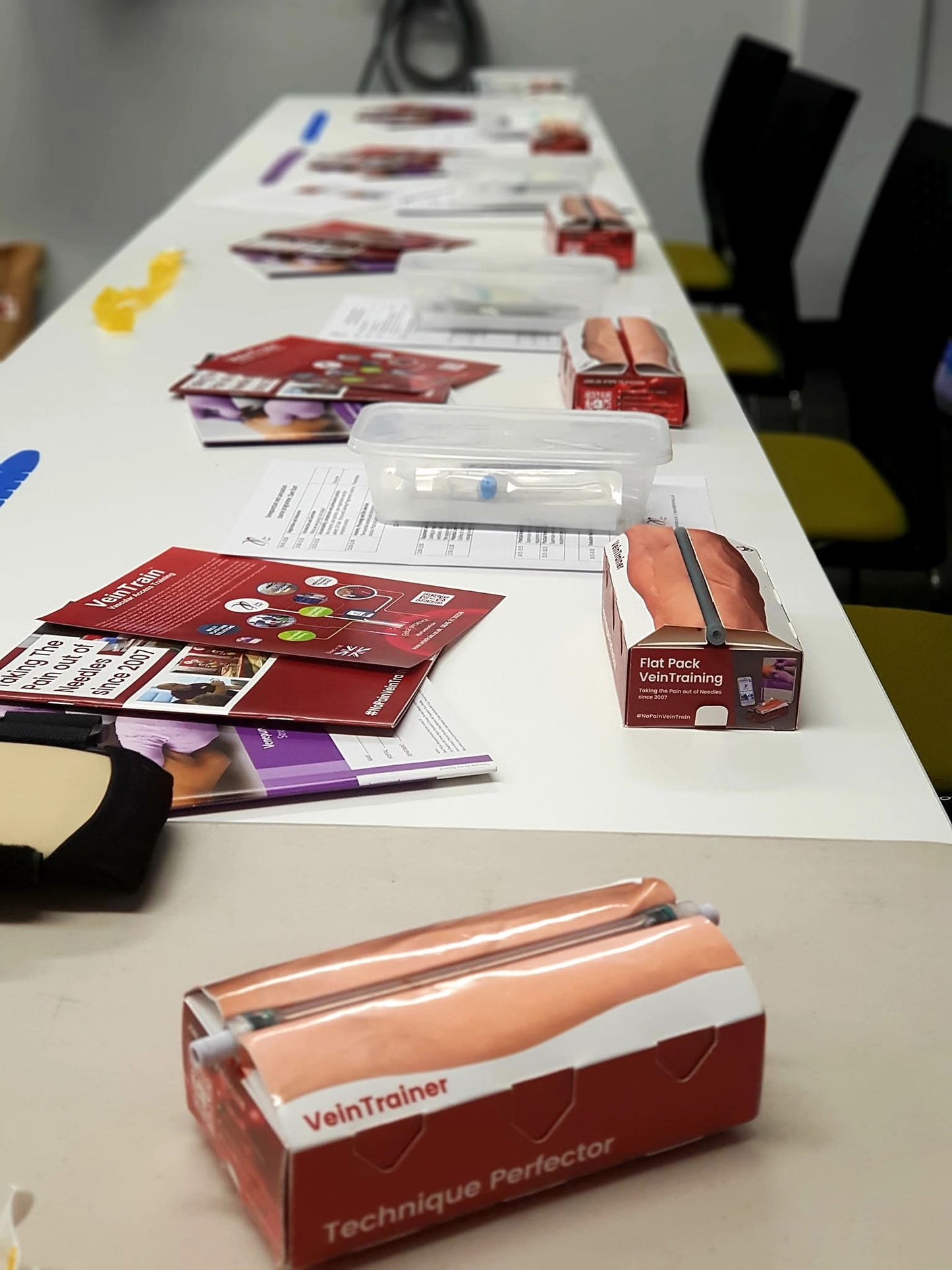 Table with medical training VeinTrain flat-pack vein simulator for phlebotomy and cannulation training
